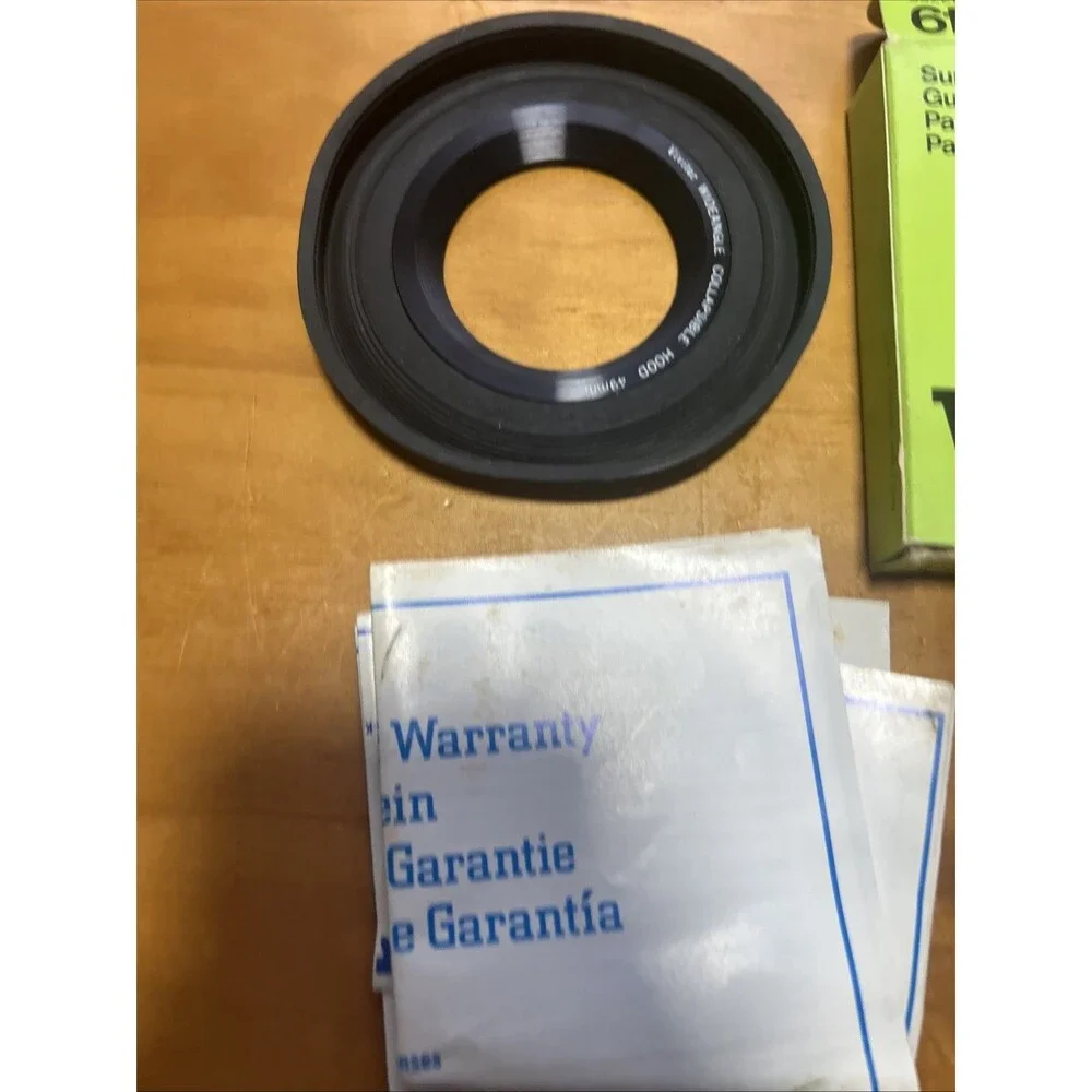 Vivitar super wide angle collapsible lens hood. 49mm thread. New